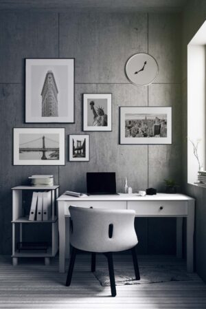 Interior minimalista con escritorio y arte gráfico