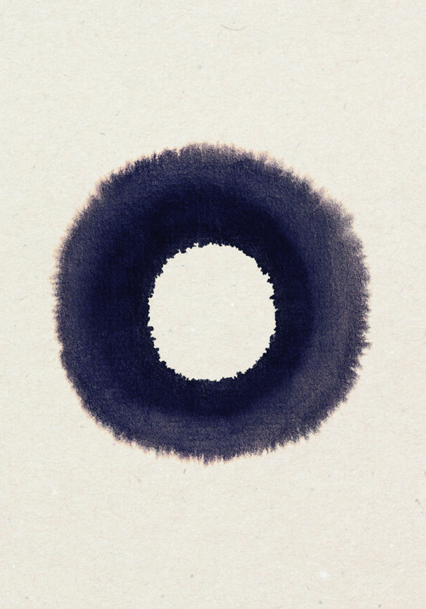 Círculo de tinta sobre papel texturizado