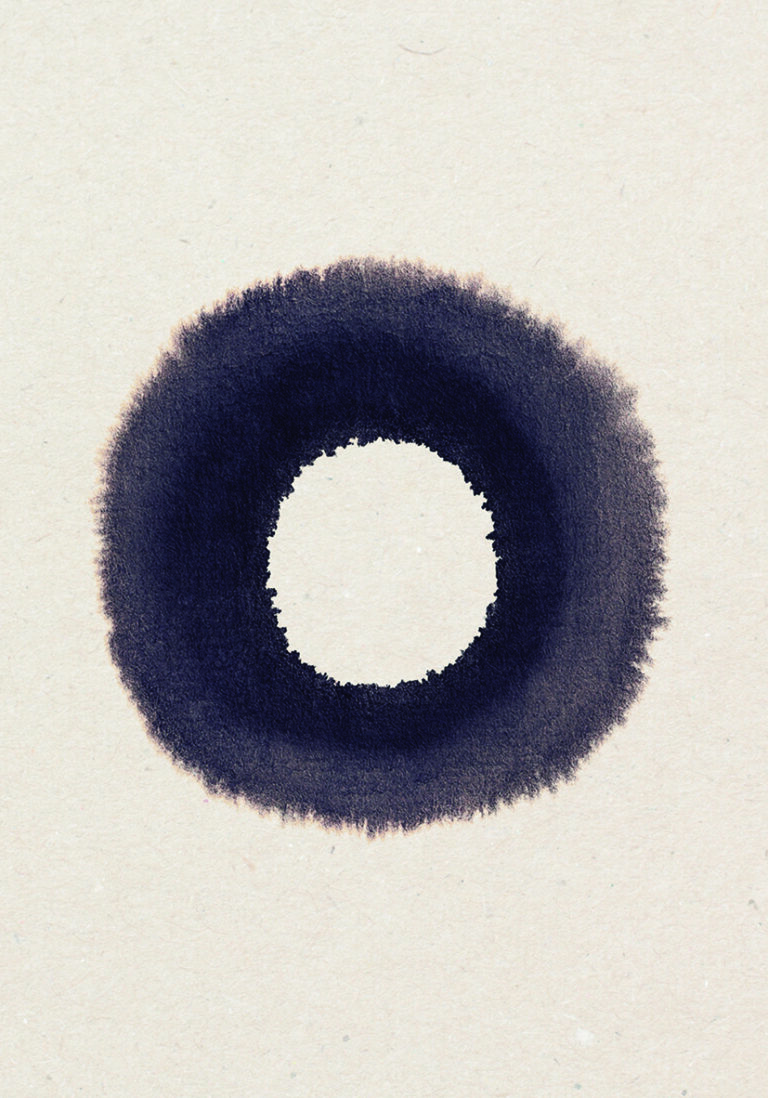 Círculo de tinta sobre papel texturizado