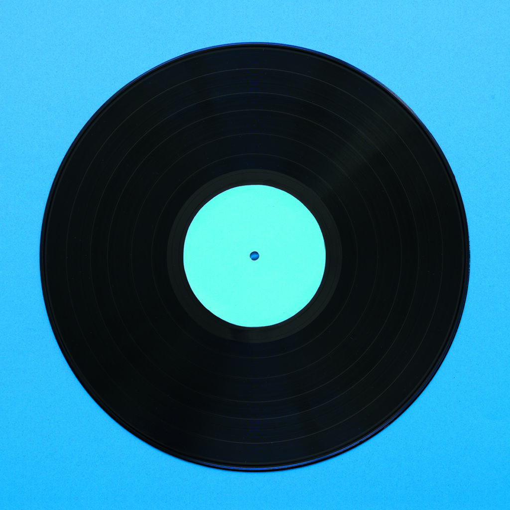 Vinilo vintage sobre fondo azul