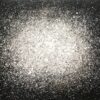 Salpicaduras blancas sobre fondo oscuro