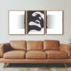 Salón minimalista con láminas abstractas