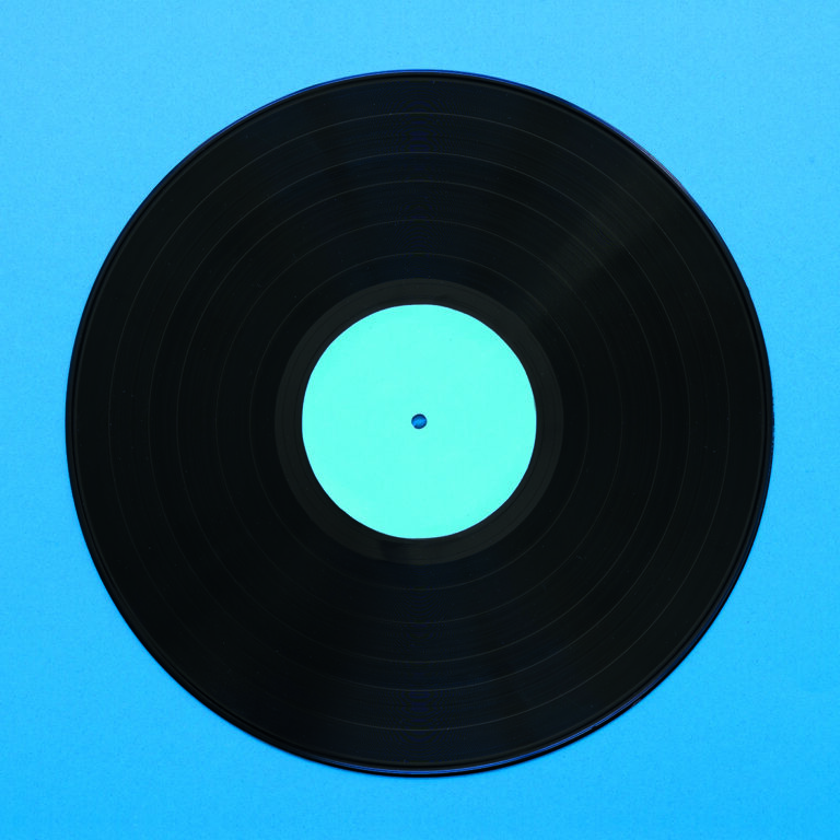 Vinilo vintage sobre fondo azul